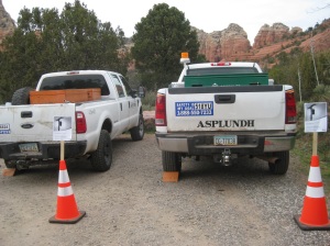 Trucks parked behind cones